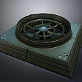 Vintage Metallic Mechanical Device With Intricate Circular Gear Design And Square Base
