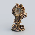 Vintage Brass Mantel Clock With Intricate Floral Carvings And Ornate Decorative Design