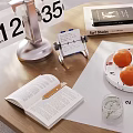Modern Tea Set On Wooden Table With Open Book Fresh Fruits And Glass Cup