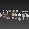 Assorted Colorful Candies and Desserts Including Donuts Gingerbread Men Lollipops and Cookies on Pink Background
