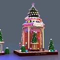 Christmas Gingerbread House Display With Small Trees Candy Decorations And Merry Christmas Sign