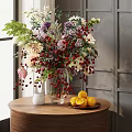 Vase with Colorful Flowers and Berries on Wooden Table with Lemons Against Gray Background