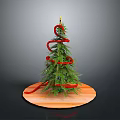 Decorated Christmas Tree On Wooden Circular Base With Red Ribbon Wrapped Around Branches
