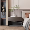 Modern Bedroom Side Cabinet With Gray Finish Decorative Rabbit Figurine Vase And Books