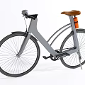 Modern Grey Bicycle With Brown Seat Black Wheels And Orange Accent