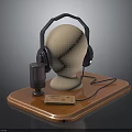 Headphones and Microphone Electronic Device on Mannequin Head Display with Wooden Base