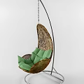 Rattan Hanging Chair With Green Cushion And Woven Design For Comfortable Relaxation