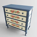 Floral Patterned Chest of Drawers with Red Flower Designs and Dark Blue Legs