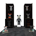 Collectible Dolls Exhibition With Various Designs On Shelves And Central Figure