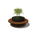 Round Wooden Outdoor Chair In Garden With Central Tree And Green Plants