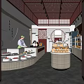 Elegant Dessert Shop Interior With Glass Display Cases Various Desserts Warm Lighting And Staff