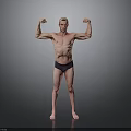 Shirtless Man Flexing Muscles In Black Underwear Against Gray Background