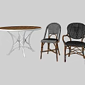 Round Wooden Top Table With White Metal Legs And Wicker Rattan Chairs Set