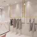 Minimalism Style Clothing Store With Clothing Racks Pink Chair Marble Counter And Chandeliers