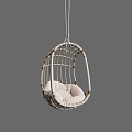 Stylish White Rattan Hanging Chair With Beige Cushion And Cozy Indoor Seating Design