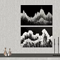Black And White Mountain Paintings On Gray Wall With Ceramic Ornaments