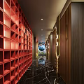 Elegant Hotel Corridor With Red Bookshelf Wall Dark Wooden Panels And Black Marble Flooring