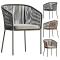 Dark Rattan Leisure Chair With Metal Legs Armrests And Light Cushion