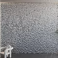 Textured Silver Metallic Background Wall Interior Design With Wave Pattern And Decor