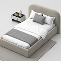 Single Bed Featuring Beige Curved Headboard White Sheets Gray Blanket Pillow and Nightstand with Lamp