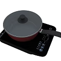 Red Cooking Pot With Glass Lid On Black Induction Cooktop Kitchen Utensil