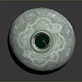 Carved Celadon Vase With Intricate Patterns And Glossy Decorative Ceramic Artwork