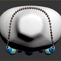Elegant Fashion Necklace With Blue Green Beads On White Mannequin Against Dark Background