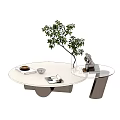 Modern Coffee Tables With White Top Black Base And Green Plant Decorative Items