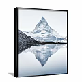 Scenic Mountain Landscape With Snow Capped Peak And Calm Lake Surface Reflection