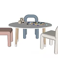Round White Kids Table with Building Blocks Toys and Curved Chairs in Pink Blue White