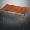 Modern Table With Copper Toned Textured Surface And Slender Metal Legs