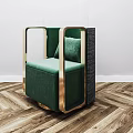 Velvet Green Accent Chair With Gold Frame And Pillow On Herringbone Wooden Floor