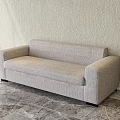 Modern Light Gray Upholstered Sofa Against Light Textured Wall On Marble Floor 3d model