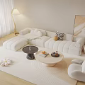 White Sectional Sofa Coffee Table Set With Potted Plant Floor Lamp And Abstract Wall Art