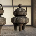 Ancient Bronze Tripod Cauldrons With Intricate Carvings And Three Legs On Stone Floor