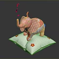 Pink Patchwork Elephant Toy Standing On White Pillow With Flower Decorations And Red Ribbons