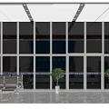Traffic Police Service Hall With Blue Background Marble Walls Service Counter Seats And Plants