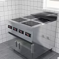 Cafeteria Kitchen Area Featuring Stainless Steel Cooking Range White Tile Walls And Gray Floor Tiles