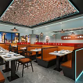 Modern Restaurant Interior With Orange Black Booths Dining Tables Marble Flooring And Decorative Ceiling