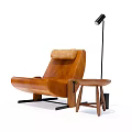 Modern Brown Leather Lounge Chair With Wooden Side Table And Floor Lamp