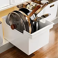 Kitchen Cabinet Drawer Organized With Neatly Stored Pots Pans And Lids