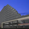 Modern Hotel Buildings Featuring Curved Facades by Marina with Yachts and Water Reflections