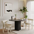 Modern Round Dining Table Set With Beige Chairs Black Base And Green Plant