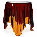 Stylish Modern Coffee Table with Transparent Surface and Flowing Fabric Accents Design