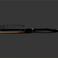 Stylish Hair Comb With Black Handle Dense Bristles And Silver Accent