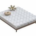 Comfortable Mattress With Grid Pattern On Wooden Frame And White Flower Woven Ring