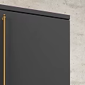Modern Black Refrigerator Freezer With Gold Handles In Sleek Kitchen Interior