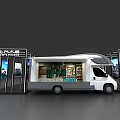 Modern Recreational Vehicle With Open Awning Parked By Exhibition Showroom Hall With Posters