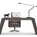 Modern Desk Setup With Laptop Table Lamp Horse Figurine And Chair