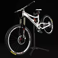 White MARMOT Mountain Bike With Red Accents Black Stand And Large Tires